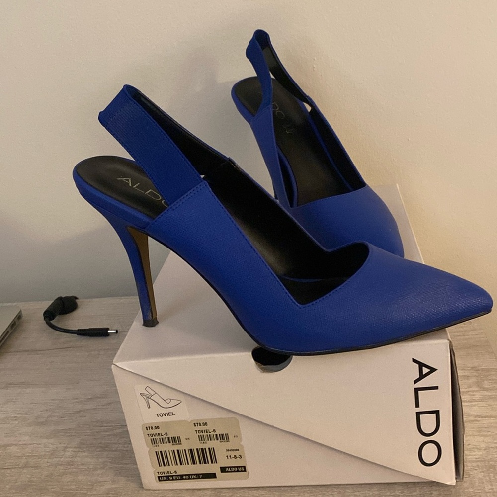ALDO blue pointed toe pump. Strap back. Worn one time.